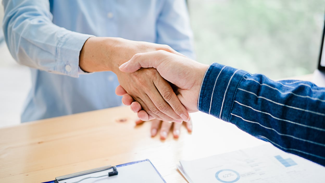 Business Partners Shaking Hands  after Discussion